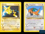 two pokemon cards, one of which is yellow and the other is blue
