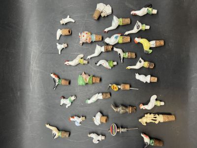 a lot of small figurines that are on a table
