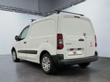 a white van that is parked in a garage