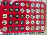a picture of a red tray with a lot of buttons on it