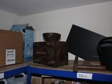 a shelf with a lot of items on it in a room