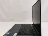 an open laptop computer sitting on top of a white table