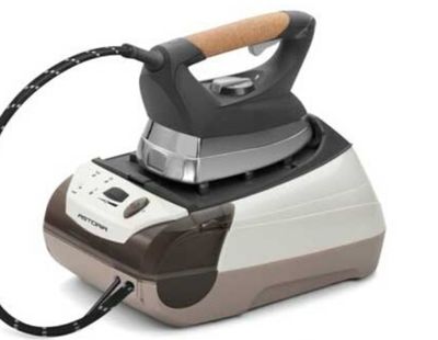 a steam iron that is sitting on top of a table