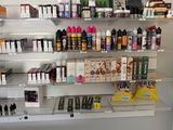 many different types of products on the shelves in the store