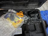 a tool box that has a pair of scissors in it