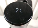 a clock that is on top of a blender
