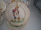 a plate with a picture of a man carrying a bag