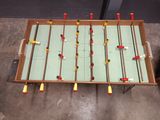 a foosball table in the middle of a room