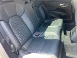 a car that has two seats in the back of it
