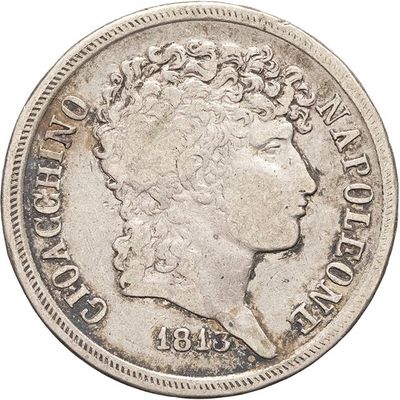 a close up of a coin on a white background