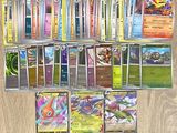 beaucoup de cartes pokemon sur la table