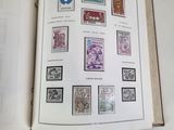 a book with a bunch of stamps on it
