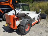 a white and orange forklift truck parked next to a black truck