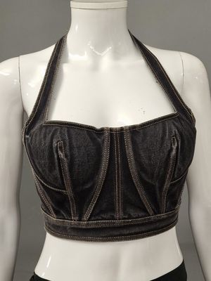 a close up of a mannequin wearing a black top and black pants