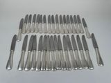 an assortment of silverware including knives, knives, and spoons