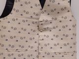 a vest with a black and white flower pattern on it