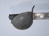 a close up of a knife with a metal handle