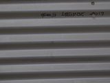 a sign on the side of a metal building