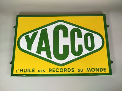 un panneau jaune et vert sur lequel est inscrit le mot « yacco »