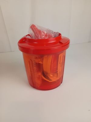 a plastic container with a plastic lid and a plastic spoon in it