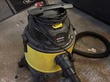 a vacuum cleaner sitting on the floor in a room