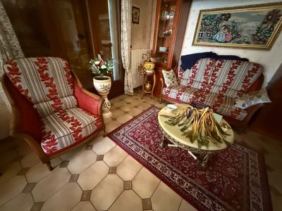 two chairs and a table in a living room
