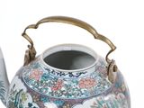 a tea pot with a handle on a white background