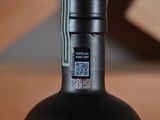 a bottle of wine with a qr code on it