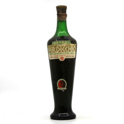 an image of a bottle of liquor sitting on top of a white surface