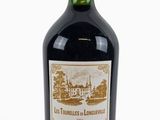 a bottle of wine that is sitting on a table