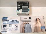 a box of clothes on a shelf next to an air conditioner