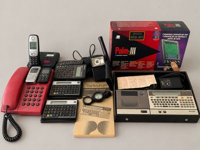 many different types of electronic devices sitting on a table