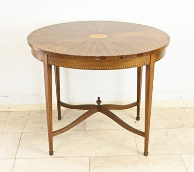an image of a round table with a wooden top