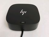 an image of a small black device on a white surface
