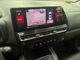 a picture of a car dashboard with a camera mounted on it