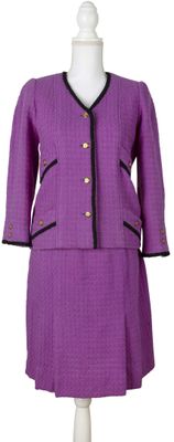 purple jacket and skirt suit on a mannequin mannequin mannequin mannequin mannequin mannequin mannequin mannequin mann