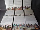 six books with illustrations of military men and women on them
