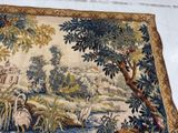 a picture of a tapestry hanging on the wall