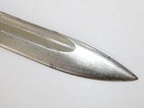 a knife that is laying on a white surface