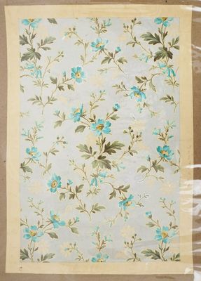 a close up of a piece of fabric with flowers on it