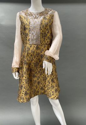 an image of a mannequin wearing a yellow and black dress