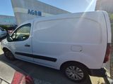 a white van that is parked in a parking lot