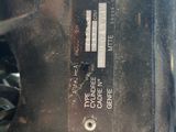 a close up of a motorcycle engine with a sticker on it