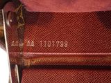 a close up view of a louis vuitton bag