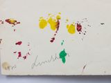 an image of a piece of paper with paint and ink on it