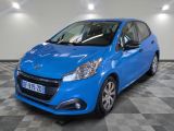 a blue car is parked in a room with a checkered floor