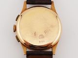 an image of a close up of a watch on a white surface