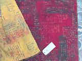 an image of a piece of cloth with a tag on it