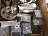 a cardboard box filled with different types of kitchen items