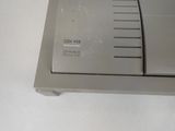 a close up of a computer on a white surface